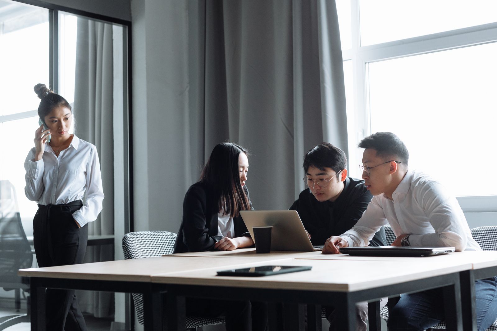 Professionals collaborating in a modern office