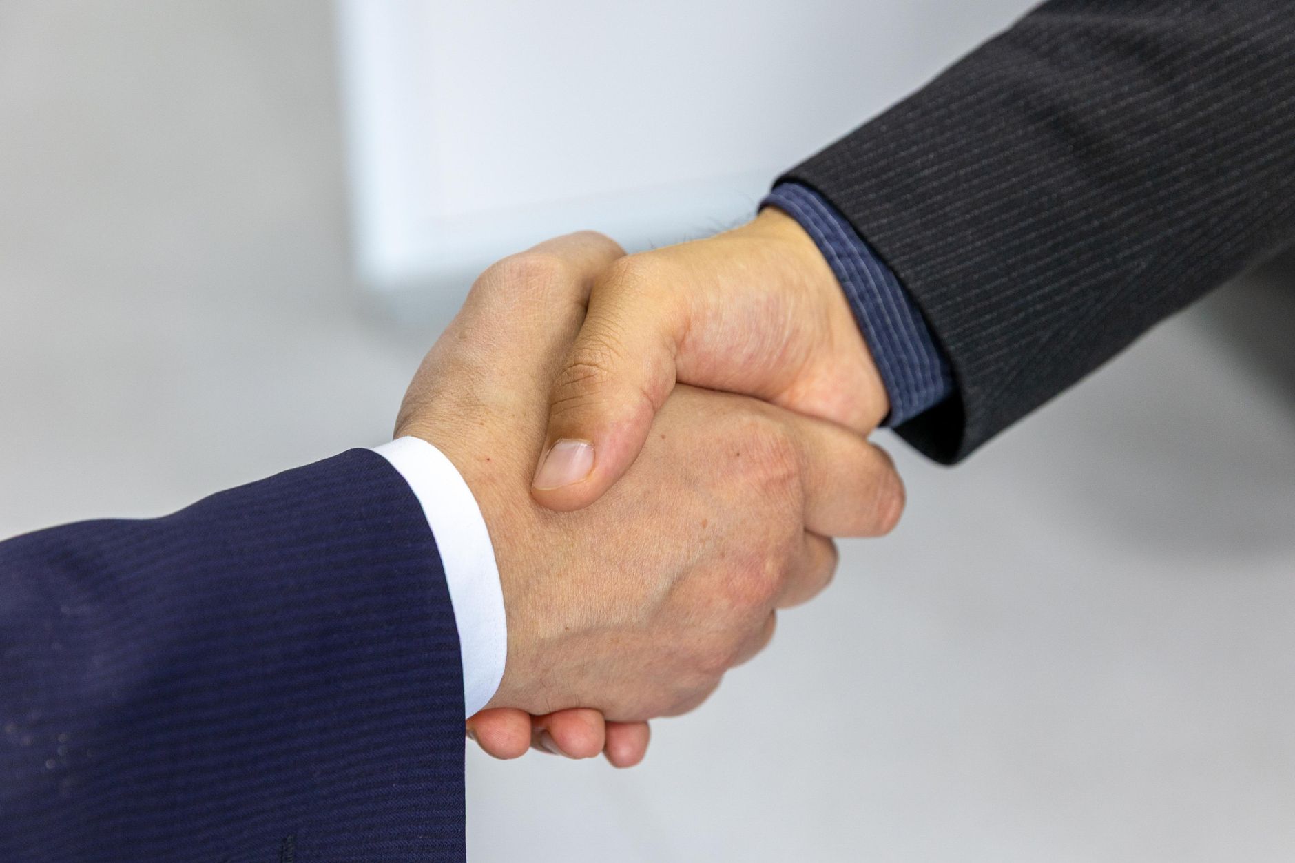Two businessmen shaking hands