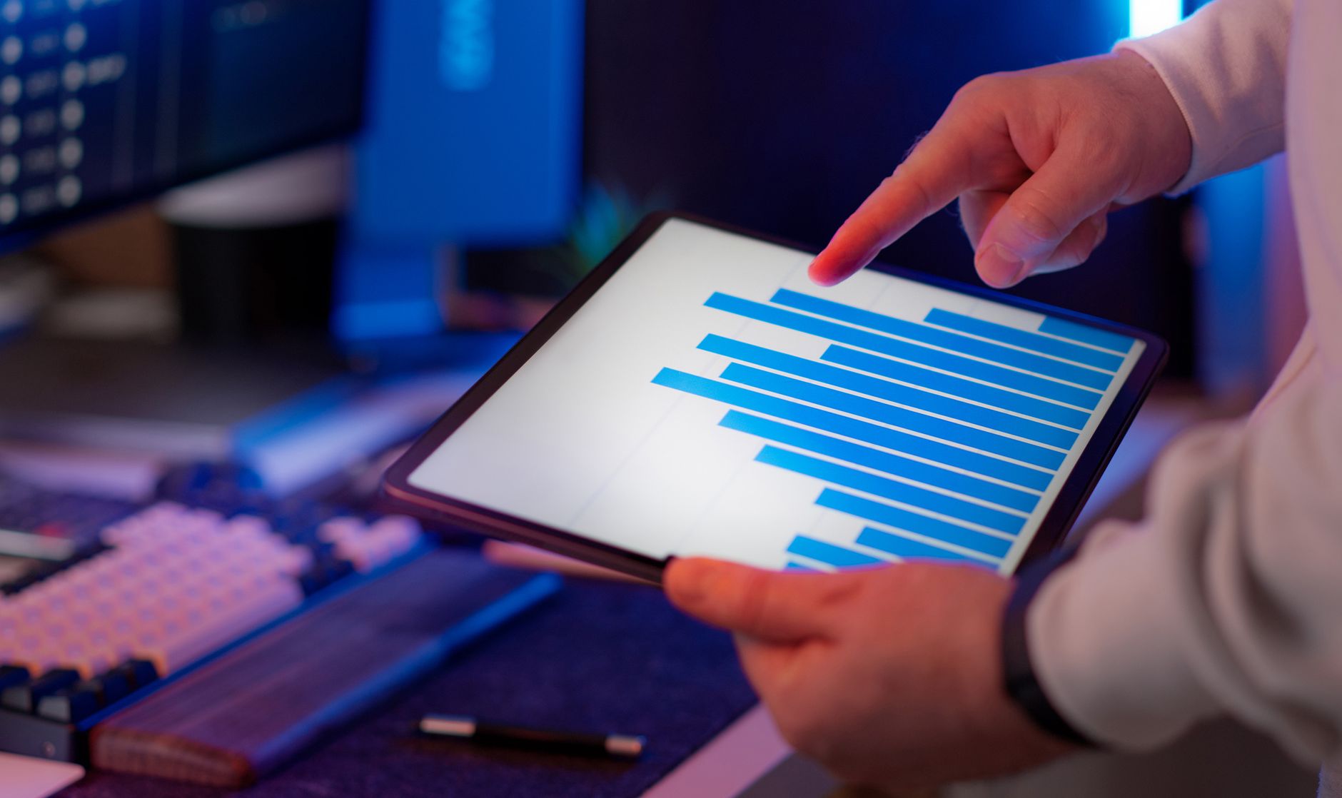 Business professional analyzing data on tablet