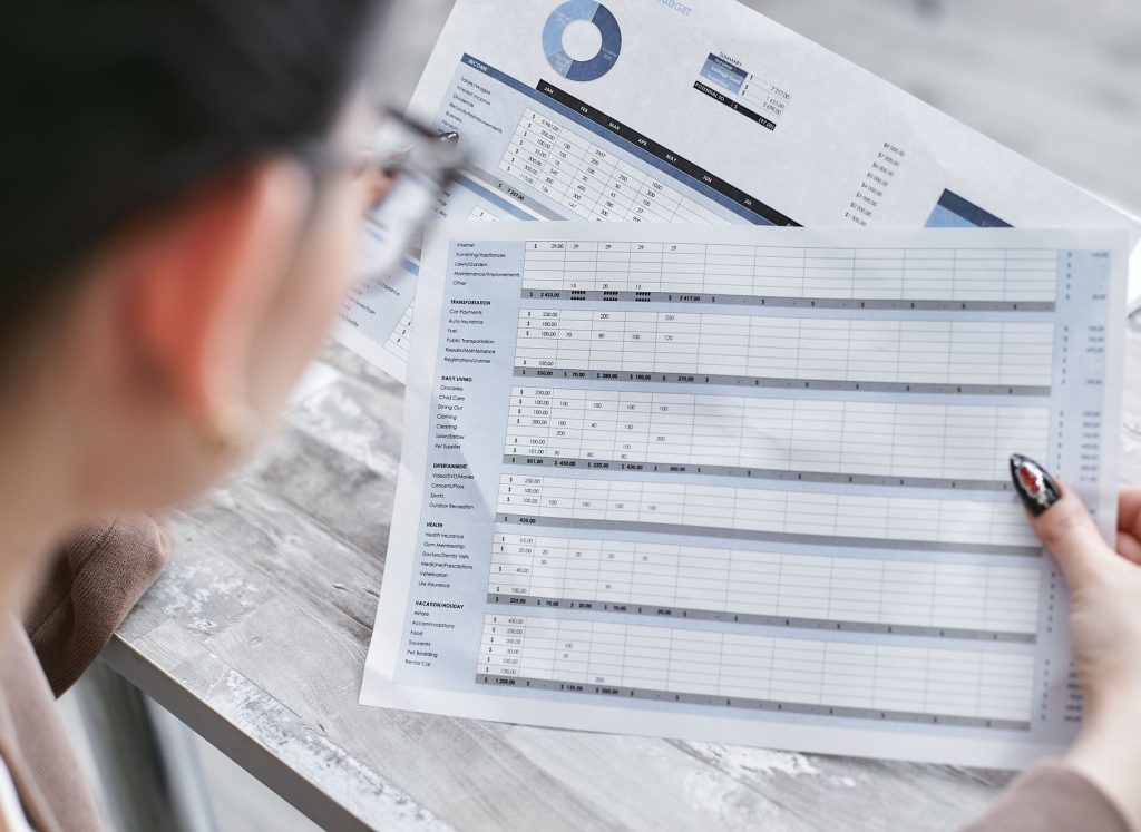 Businesswoman reviewing financial spreadsheets