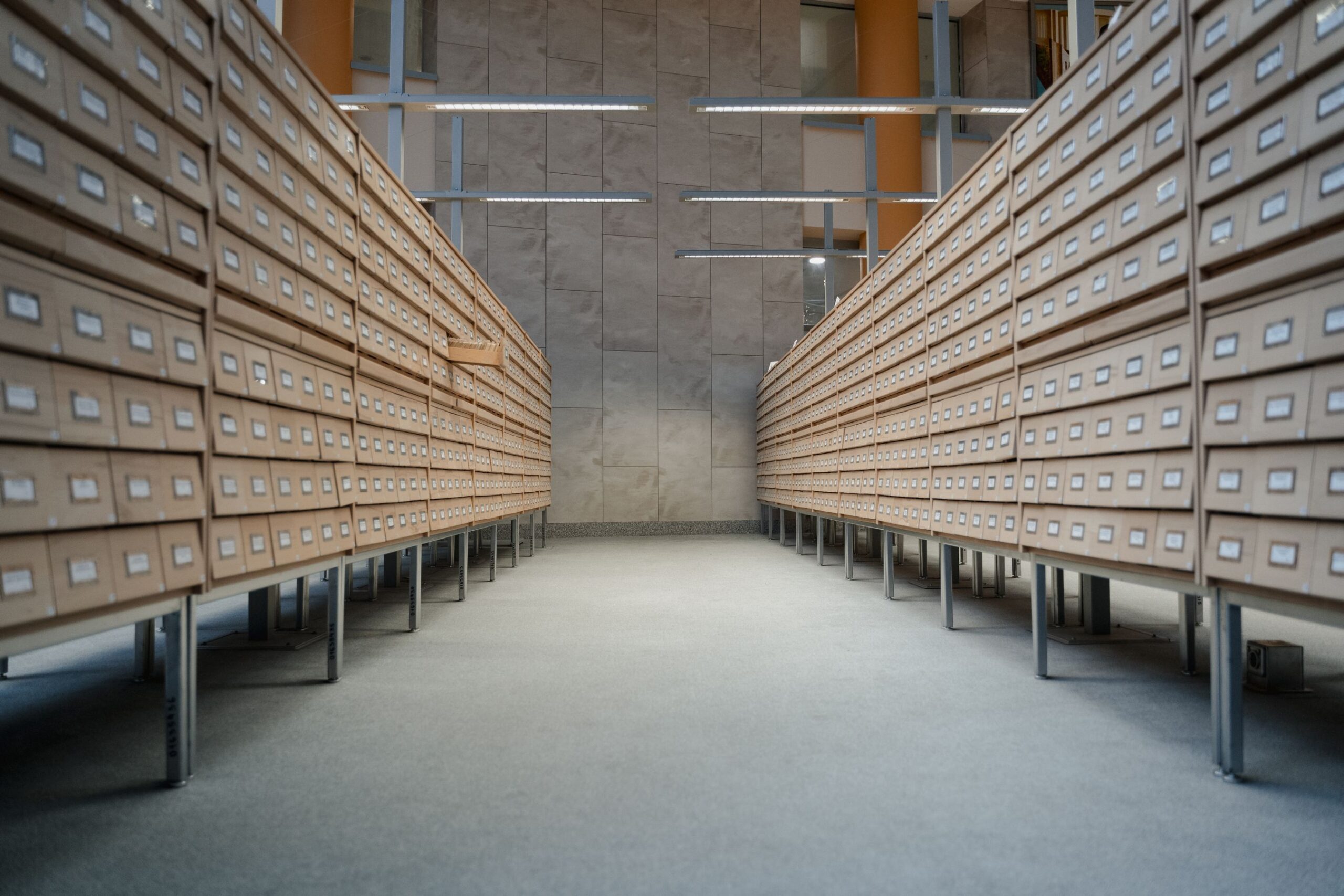 Spacious modern archive with rows of drawers for long-term document storage